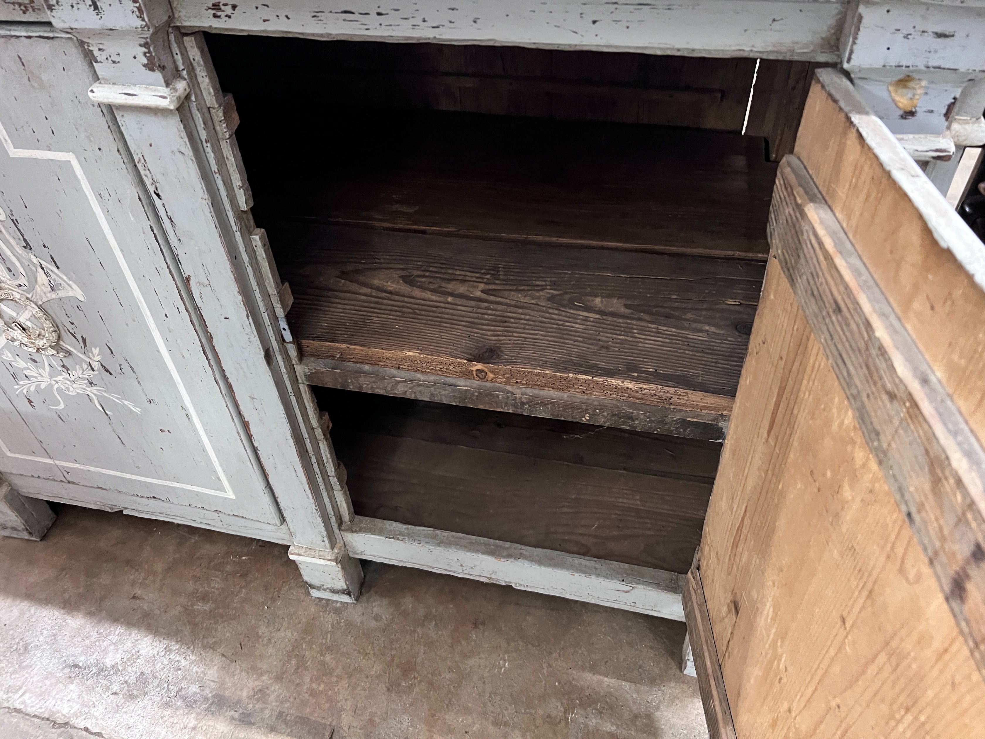 A continental painted pine low cupboard, width 125cm *Please note the sale commences at 9am.
